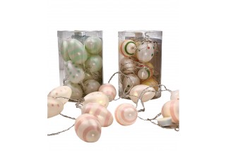 Lampki  dekoracyjne w kształcie jajek o wielkości 6/4cm, zestaw 10 światełek. Całkowita dł. lampek-200cm. Lampki świecą światłem białym.